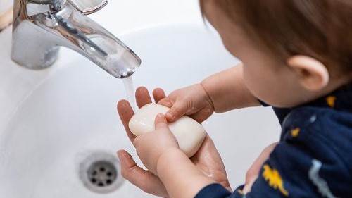 toddler handwashing Toddler washing hands with soap and water