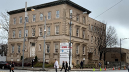 emoryuniversity.jpg Brown brick building in winter with grey sky