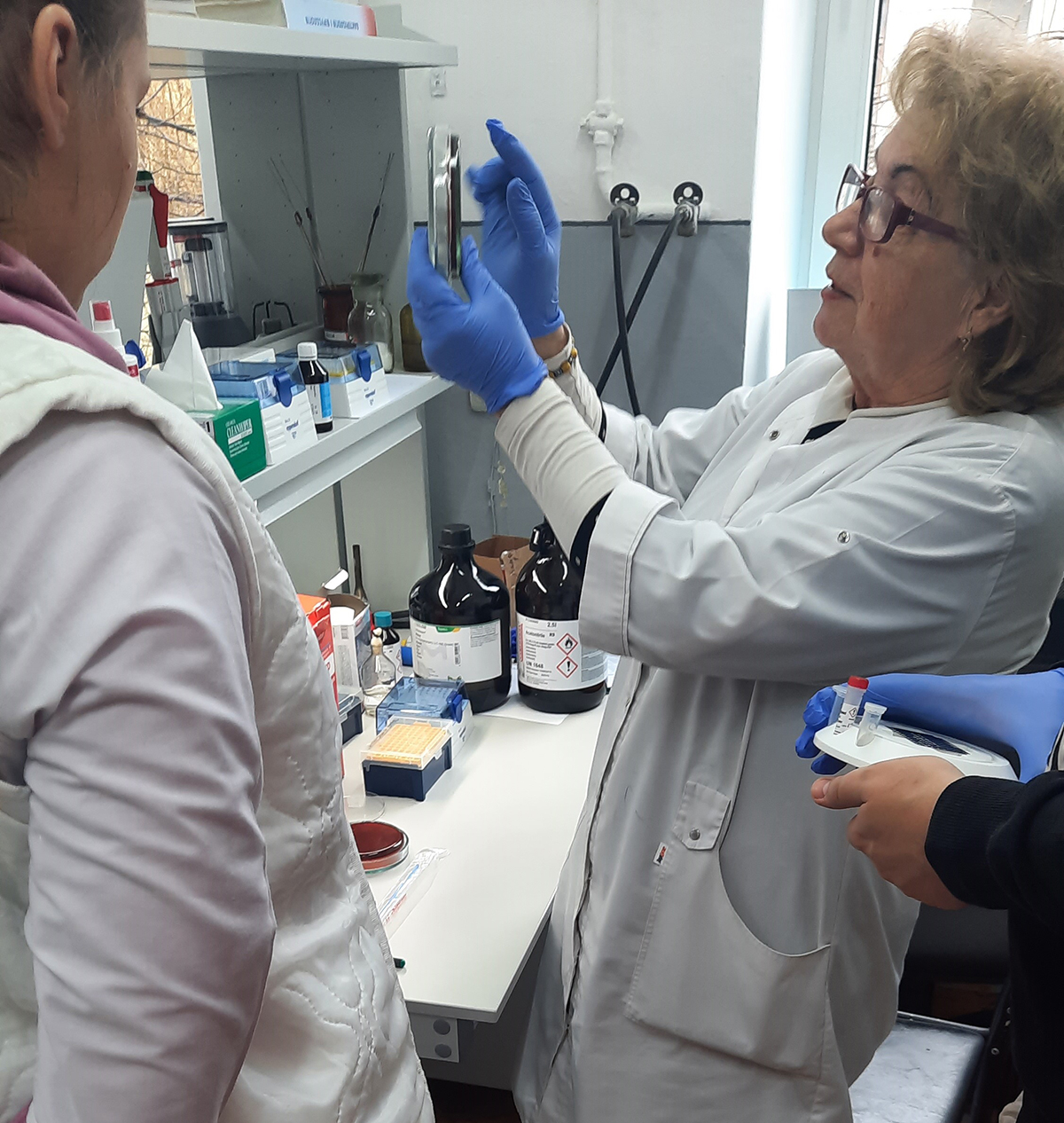 Building Lab Capacity in Ukraine Laboratorians in Ukraine participate in a training on new lab equipment to reduce the time needed to identify bacterial species.
