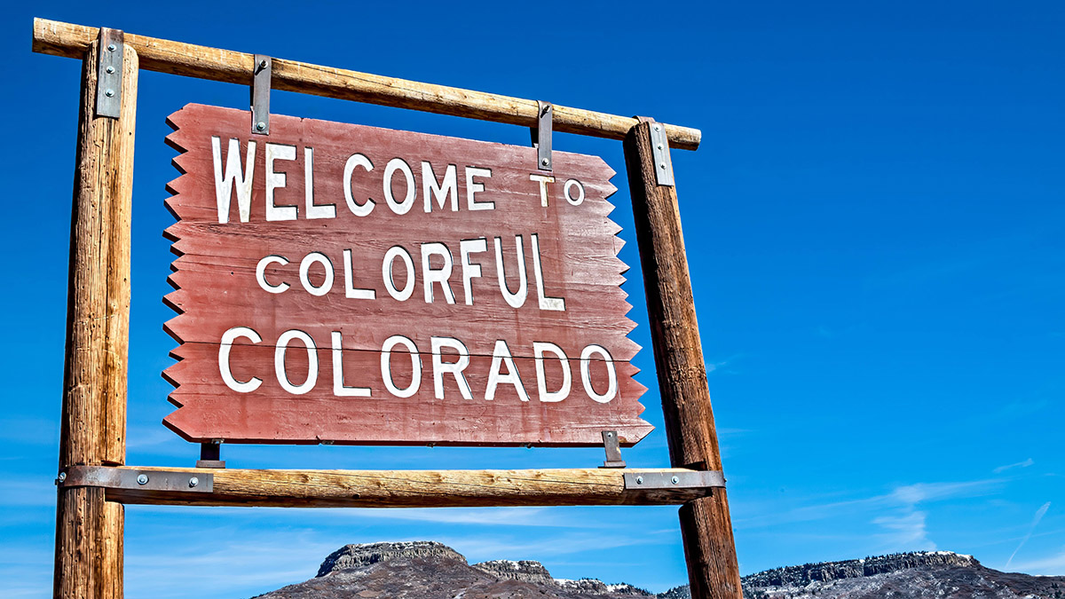 Wooden Colorado state roadside sign
