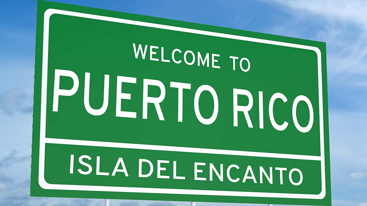 Puerto Rico Welcome to Puerto Rico sign written in English and Spanish