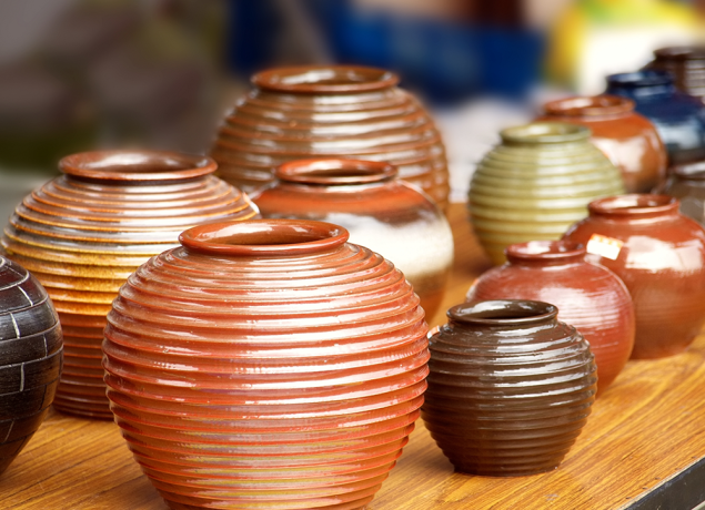 Ceramic pots Several ceramic pots sitting on a table.