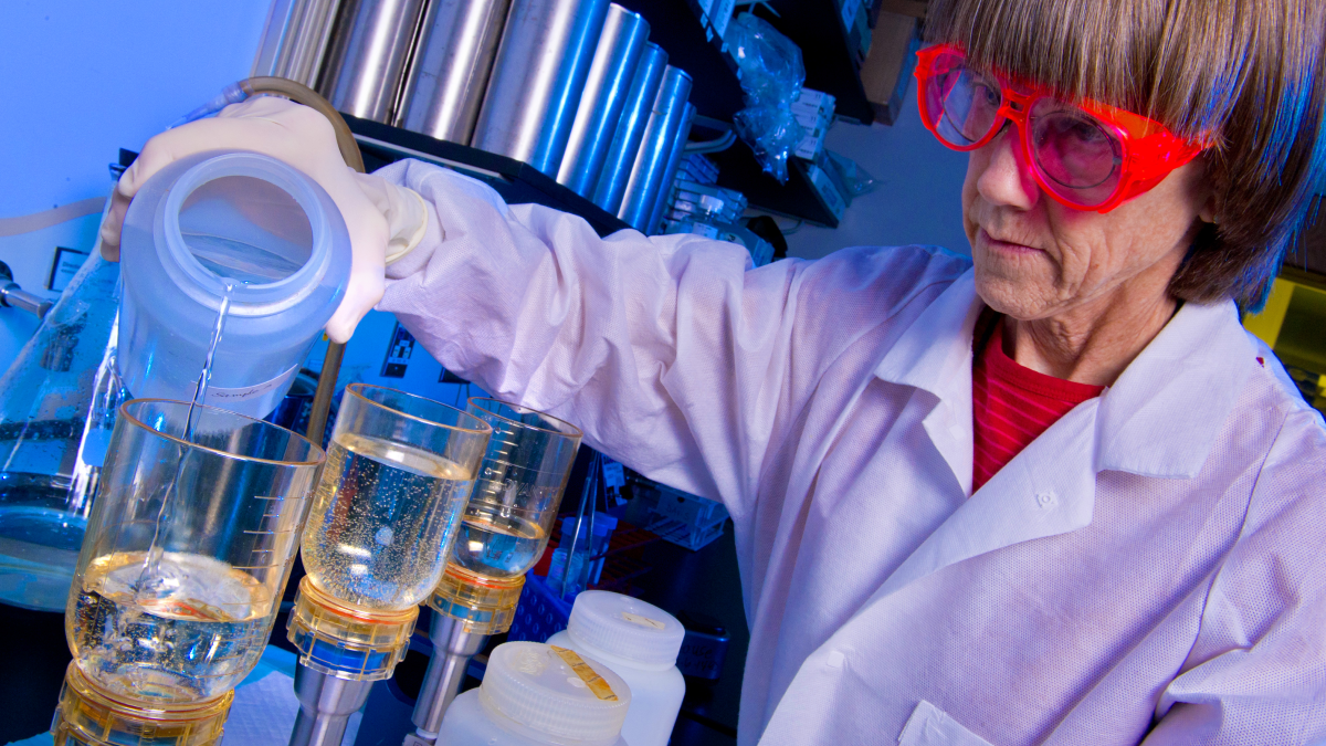 Legionella lab Laboratory scientist filtering samples.