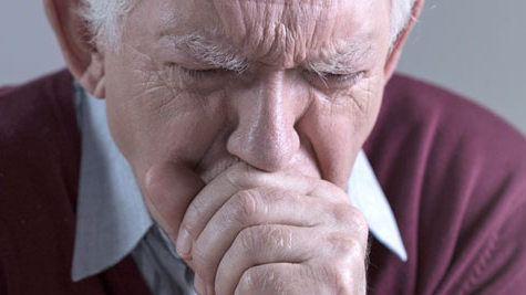 Legionnaires' disease symptoms An older man coughing