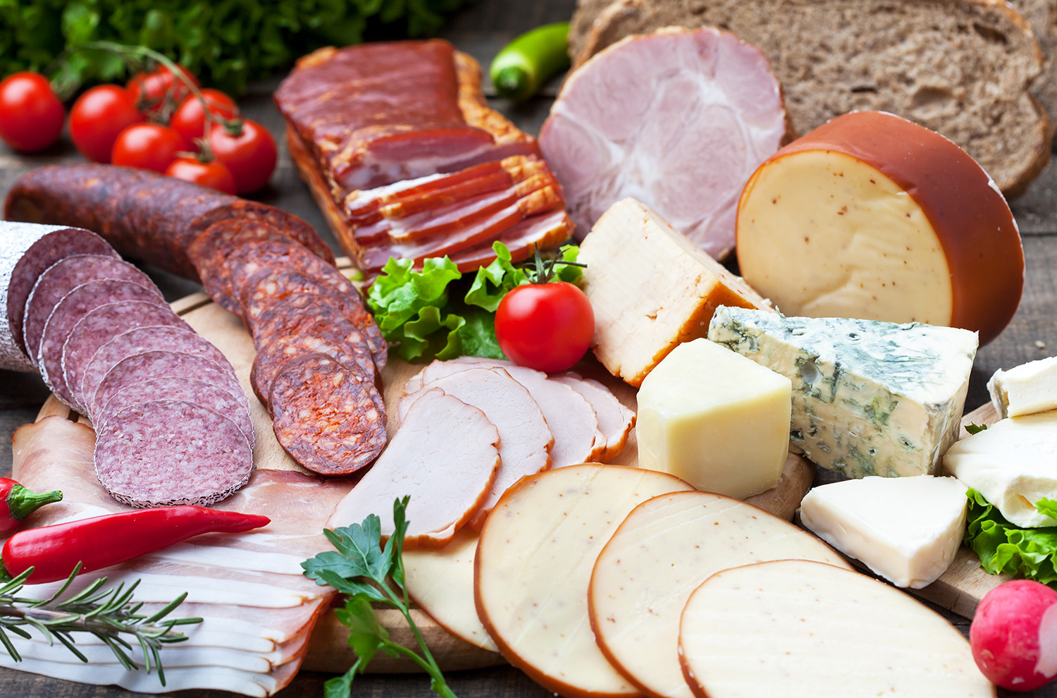 Assorted deli meats and cheeses.