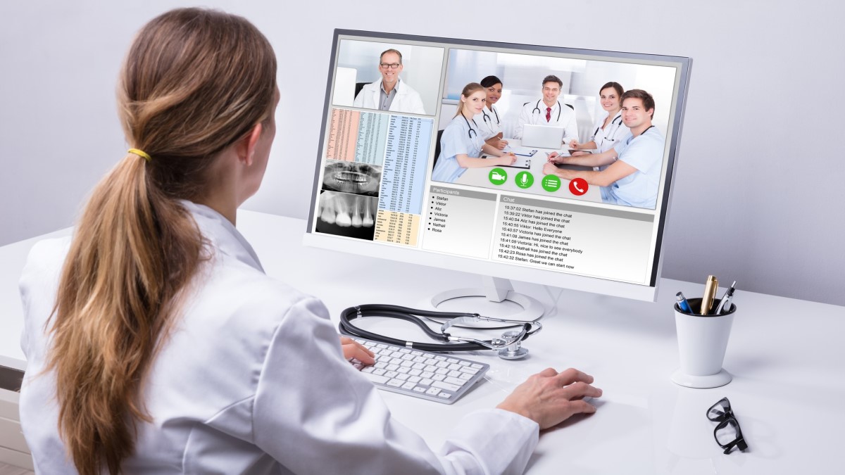 Doctor Virtual Meeting A doctor viewing a virtual meeting