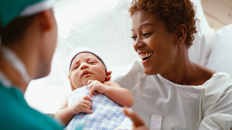 About the Maternal and Child Health Epidemiology Program (MCHEP) doctor putting infant in mother's arms