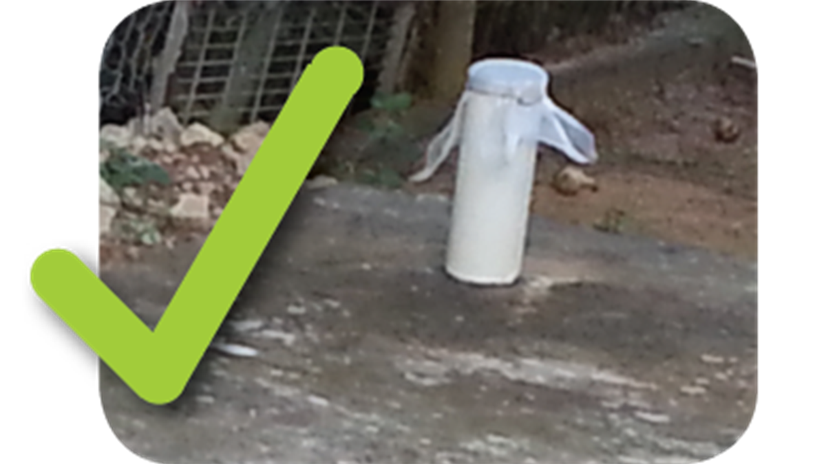 — title missing — Septic tank ventilation pipe with a mesh cover. A checkmark is added.