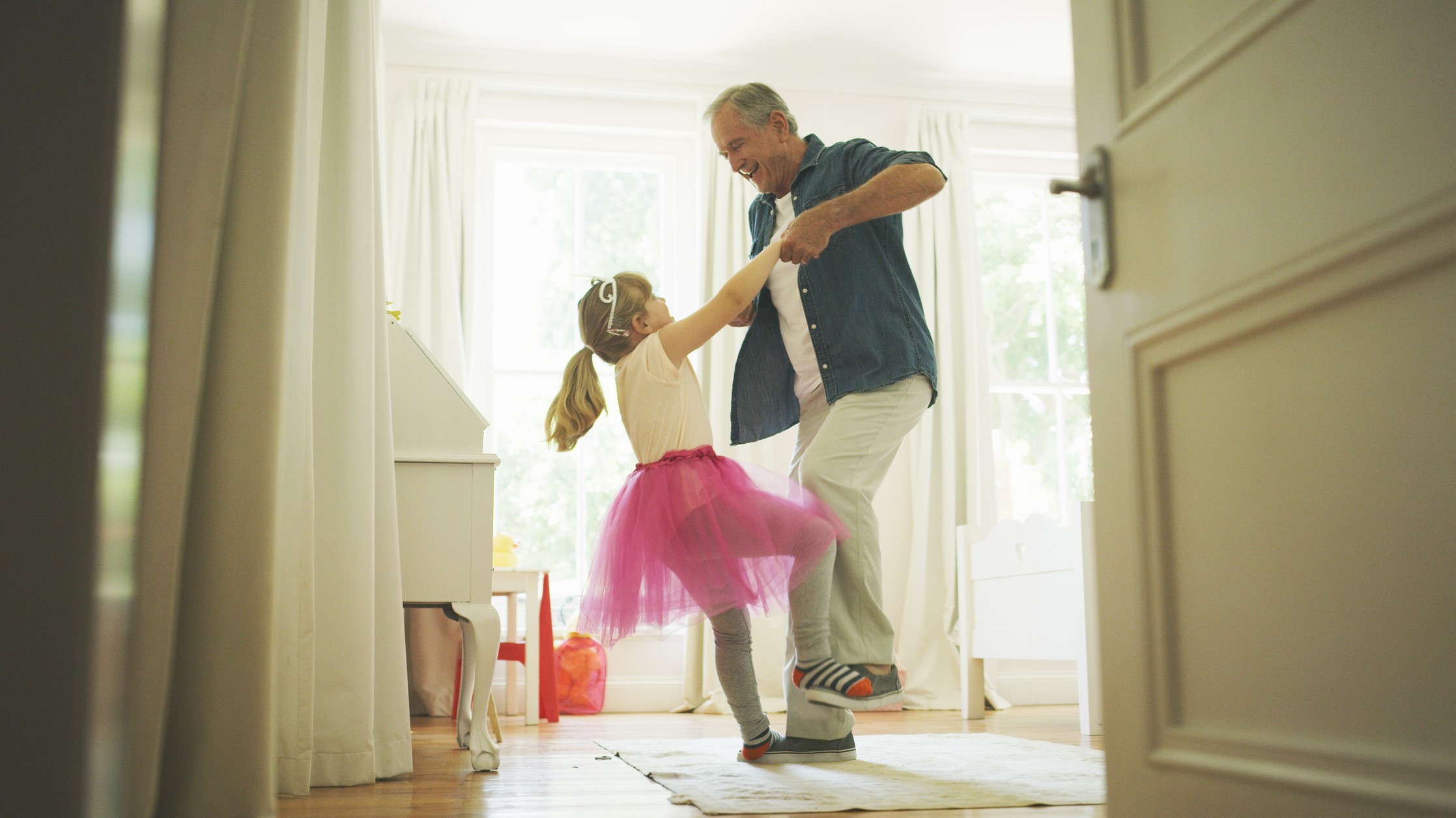 Grandfather Granddaughter Dancing _16-9 Grandfather dancing with his granddaughter.