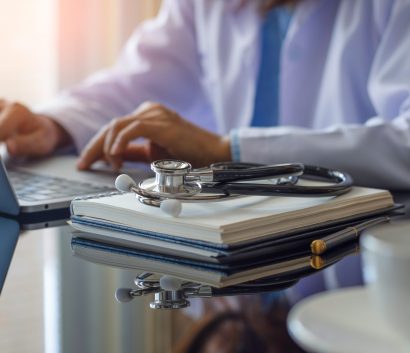 Clinician laptop Clinician using laptop