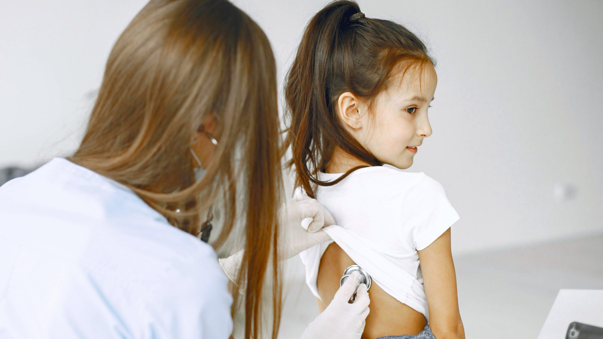 doctor examining child Doctor examining child.