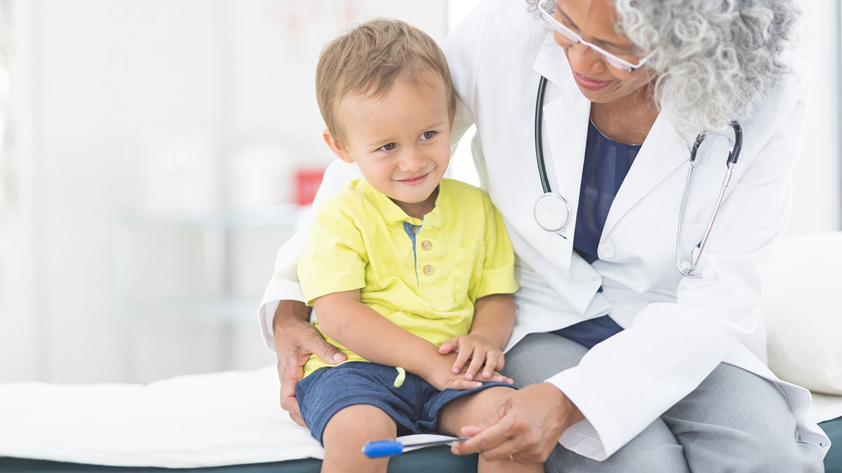 A boy at the doctor's office A young boy visits his doctor