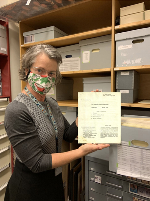 OutOfCDCMCollection02 CDC Museum Collections Manager Mary Hilpertshauser with 1960 CDC Hepatitis Surveillance Report