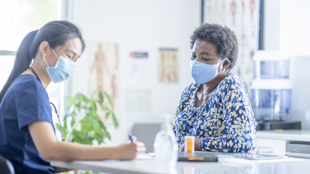 — title missing — Medical assistant with patient