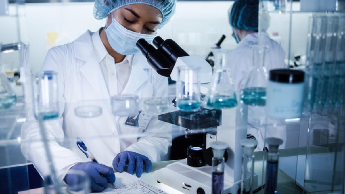 NCHHSTP Careers A scientist completing paperwork in a laboratory setting