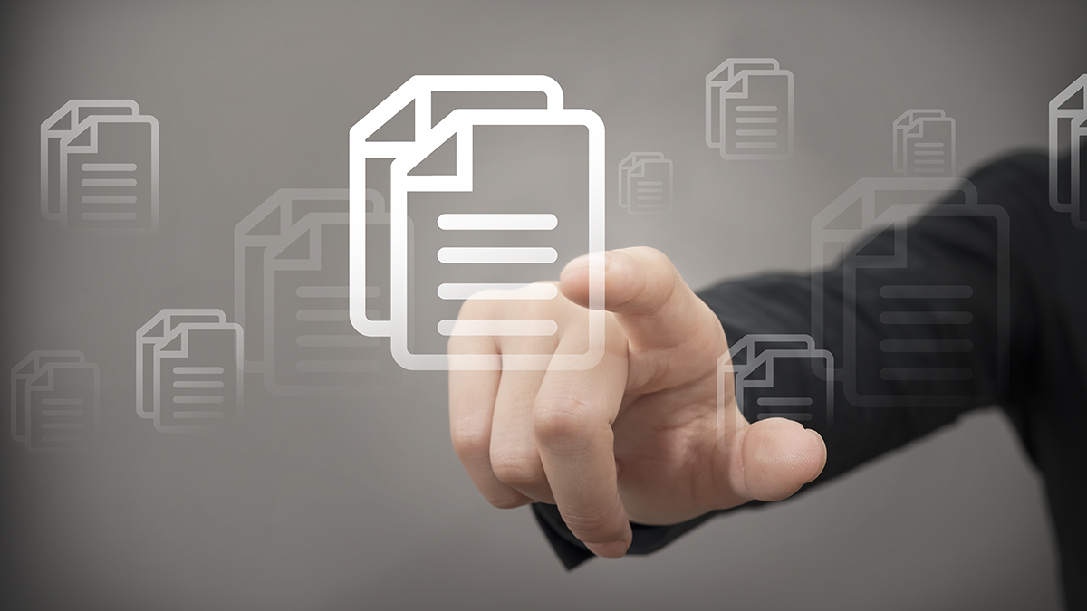 Image of finger touching the digital representation of a document