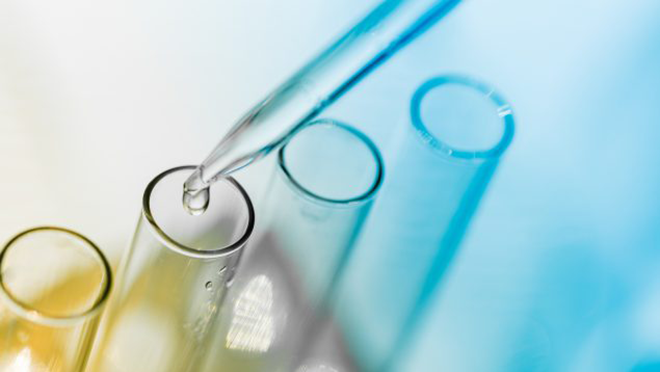 Test Tube Rack Image of drops going into one of four test tubes