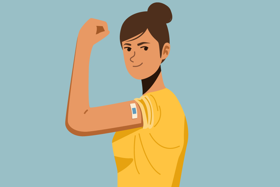 1_Vaccination A person showing their arm with band-aid.