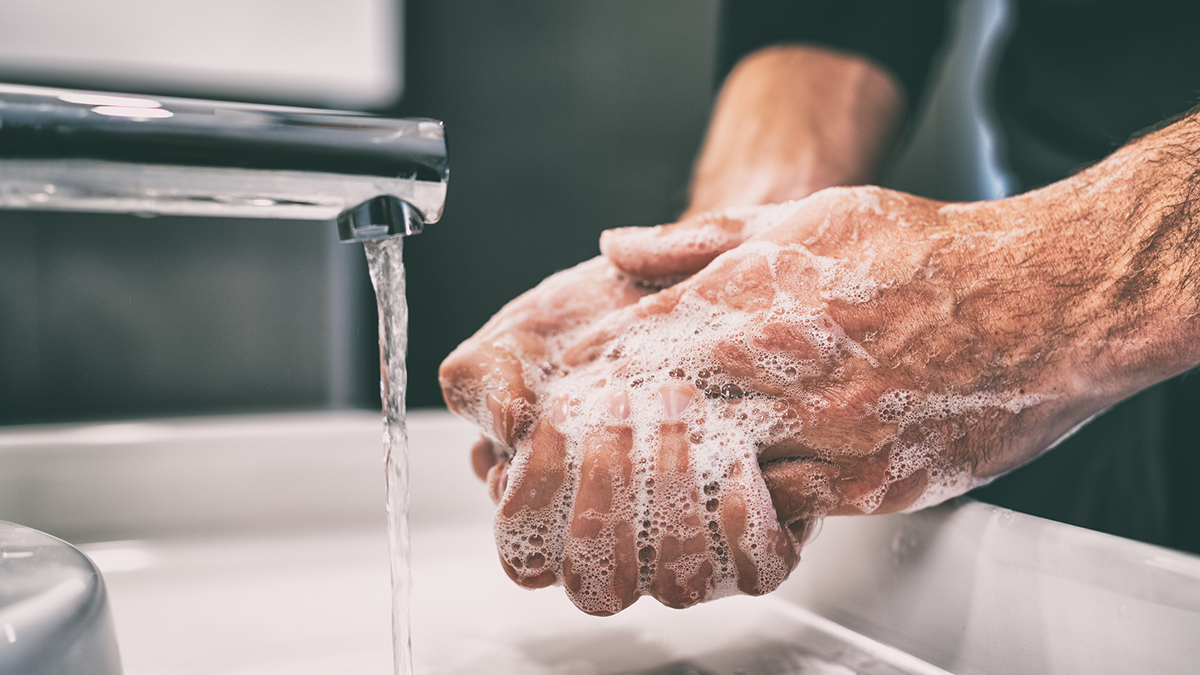 handwashing Close up of someone washing their hands.