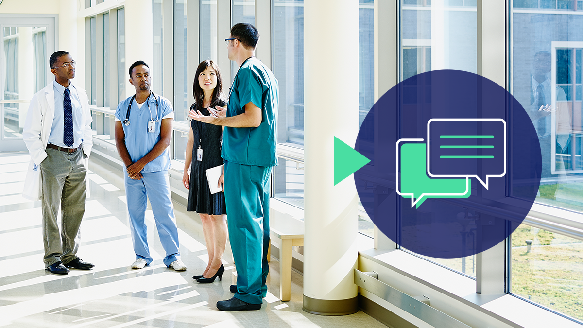 Action 4 Image 1 A varied group of healthcare workers chats in a hallway with an icon of overlapping speech bubbles.