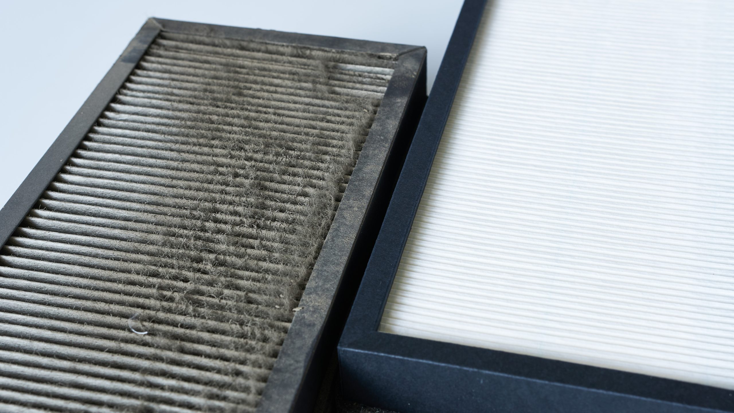 Air filters A dirty and a clean air filter.