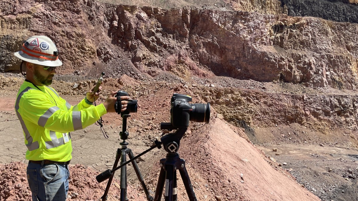 Mining researcher thermal camera at surface mine NIOSH researcher collecting infrared data at a surface mine