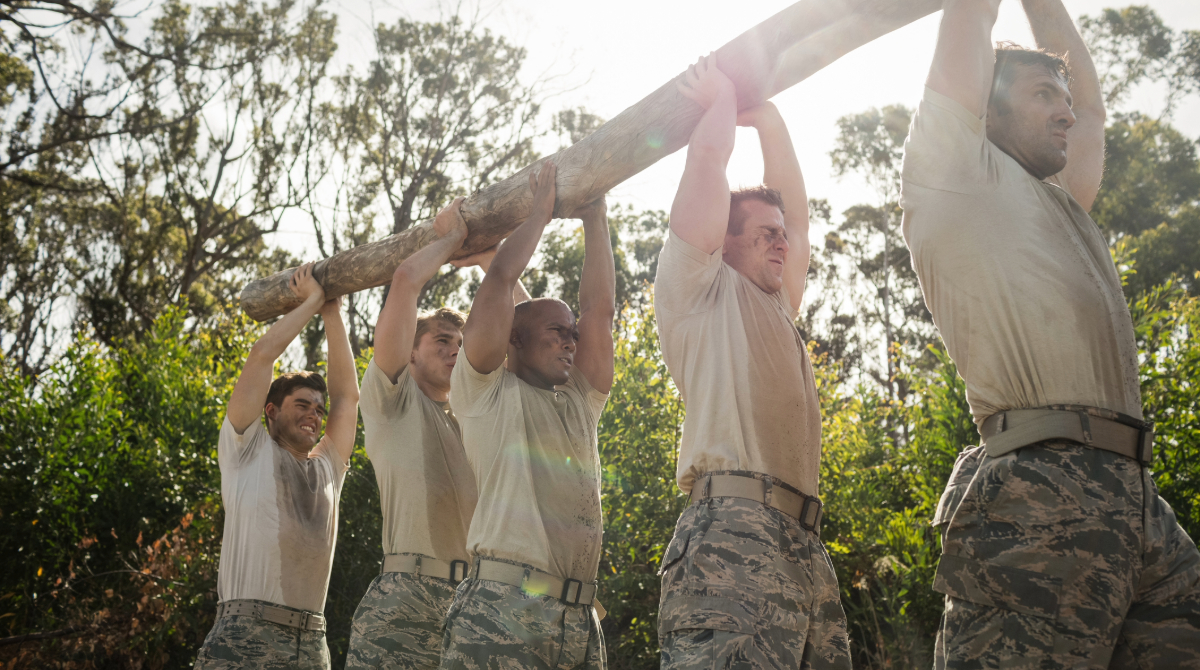 — title missing — Military personnel exercising outside, sweating