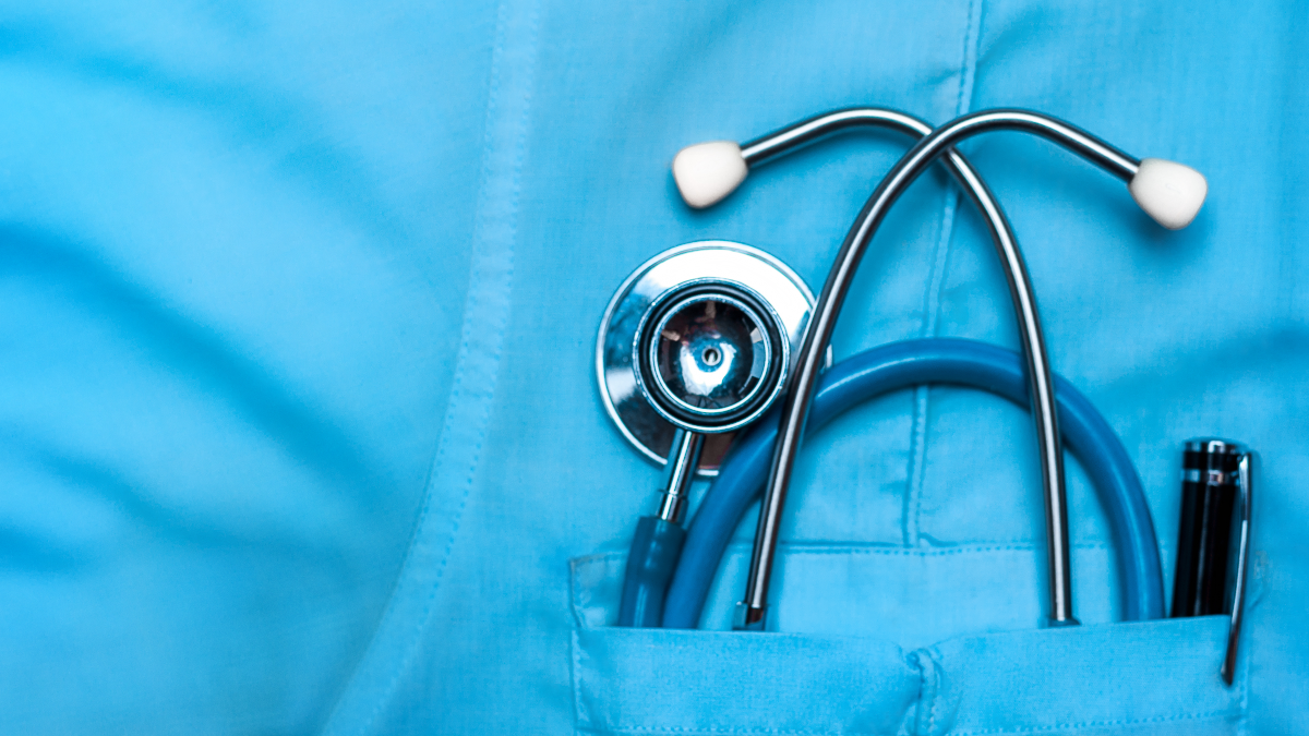 — title missing — Stethoscope in the pocket of healthcare scrubs.