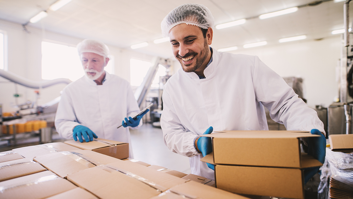 — title missing — Workers in sterile environment pack orders