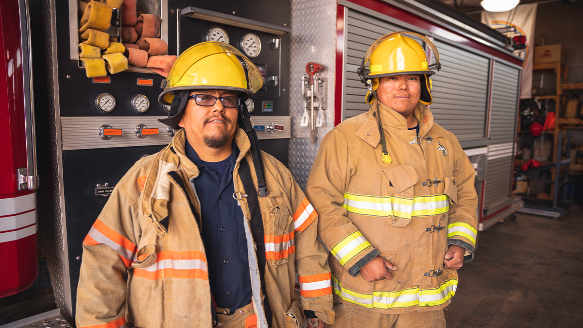 — title missing — Two male firefighters on the Navajo Reservation, Utah. Image by Rich Vintage, Getty Images