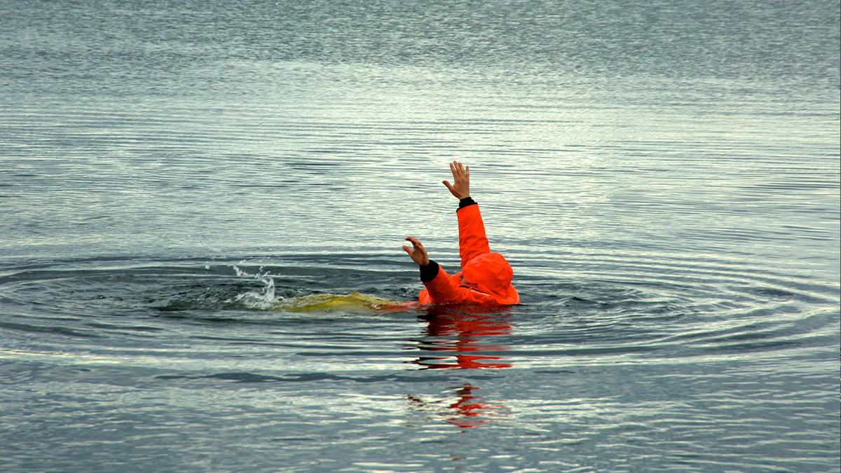 Man overboard thumbnail image image of a lone commercial fisherman in the water