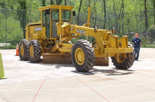 lakelynn1.jpg Motor Grader being placed on polar grid.