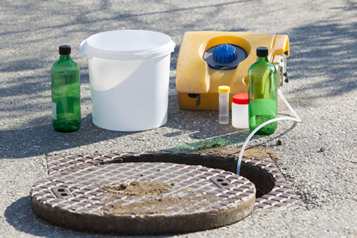 GettyImages-181876834-500px Taking a wastewater sample