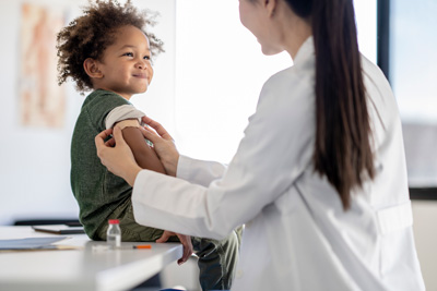 child-vaccination Child receiving vaccination