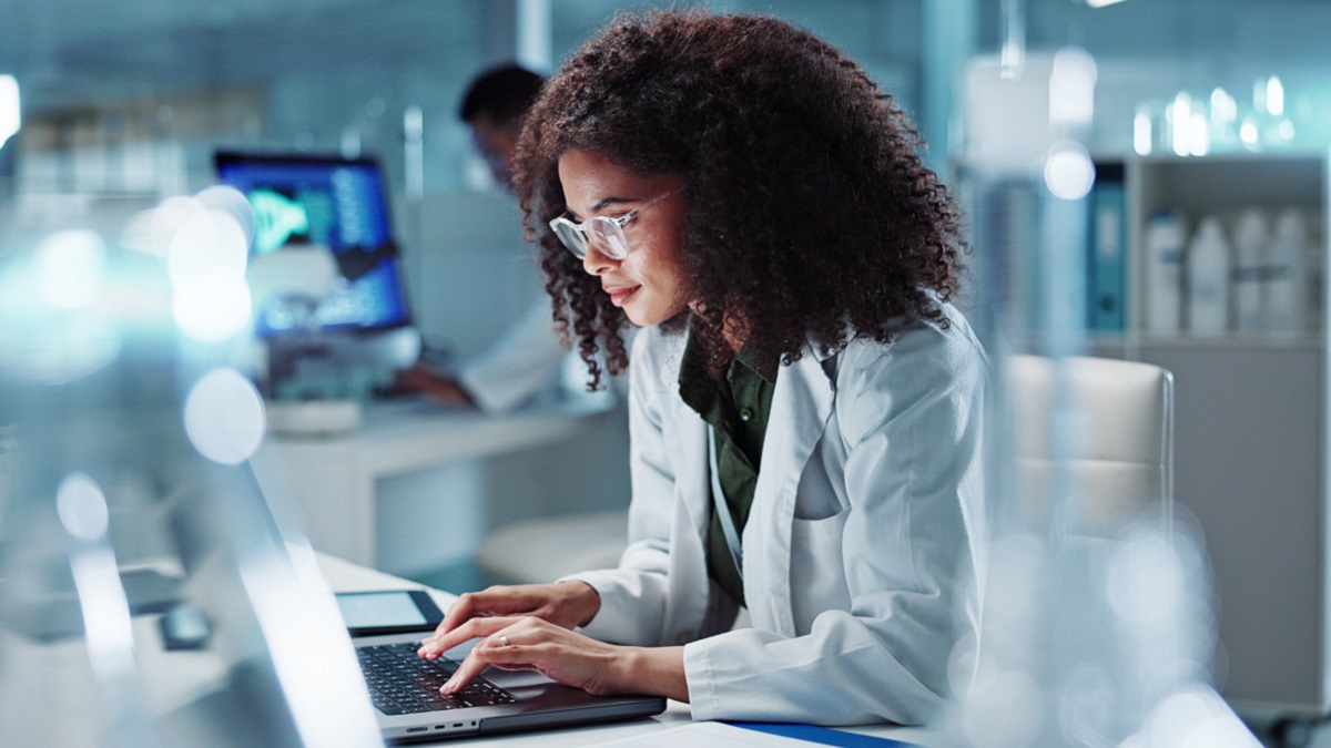 innovation woman on laptop in office