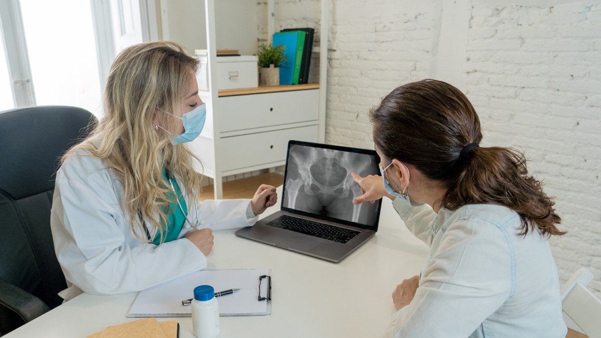 Doctor Scan a doctor showing a scan to patient