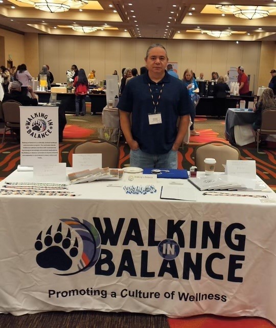 OverdosePrevention-DFC-CherokeeNation Abraham Bearpaw (Cherokee) showcases his program Walking in Balance at a health fair