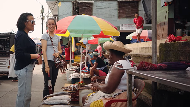 WMoD-Manuela-Nicole-community Two staff members chatting with residents of Guapi.