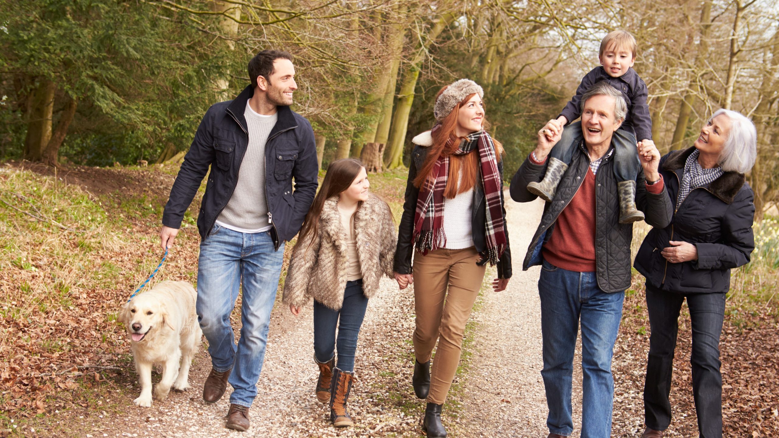 — title missing — Family walking in nature