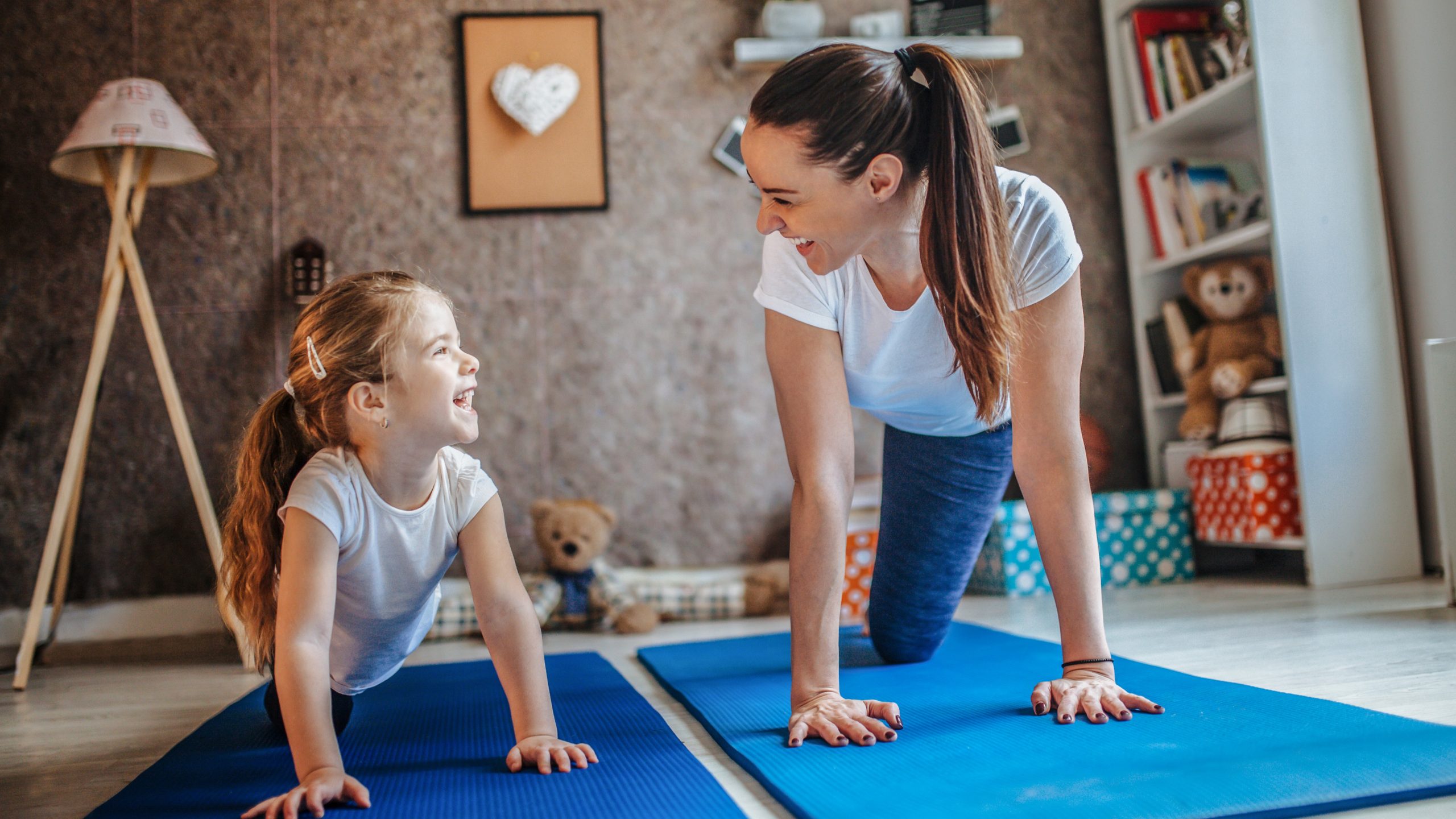 — title missing — Mother and daughter on mats.