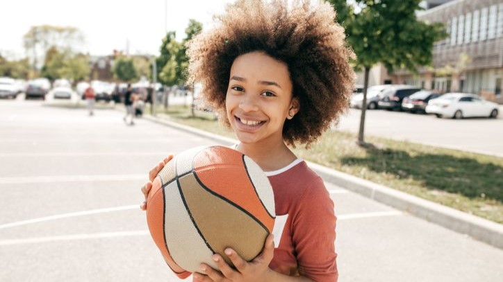 -- title missing -- boy holding basketball