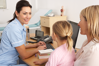 A nurse is meeting with a female adult and child A nurse is meeting with a female adult and child.