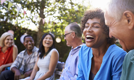 header-shingles-vp3 Group of people laughing.