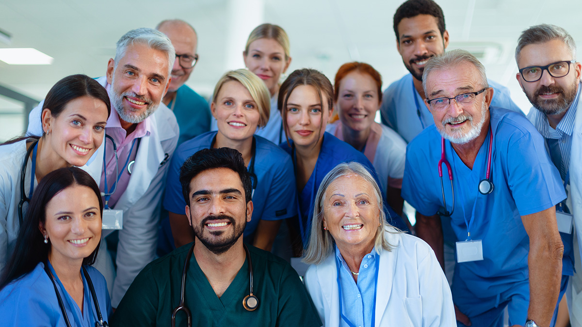 Group of doctors, nurses and other medical staff in hospital Photo of a group of healthcare providers of mixed genders, races and ages.