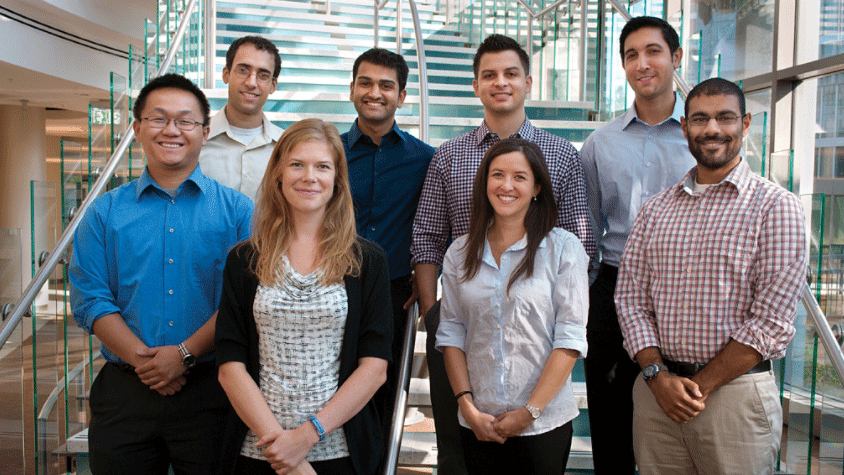 CDC-Fellows a group standing on stairs, two men and women in the front row and four men in the back row