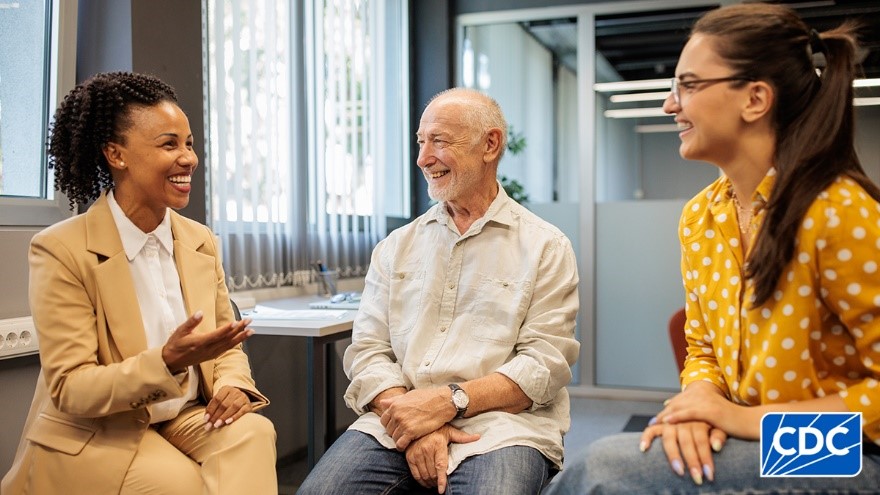 Three people in a meeting