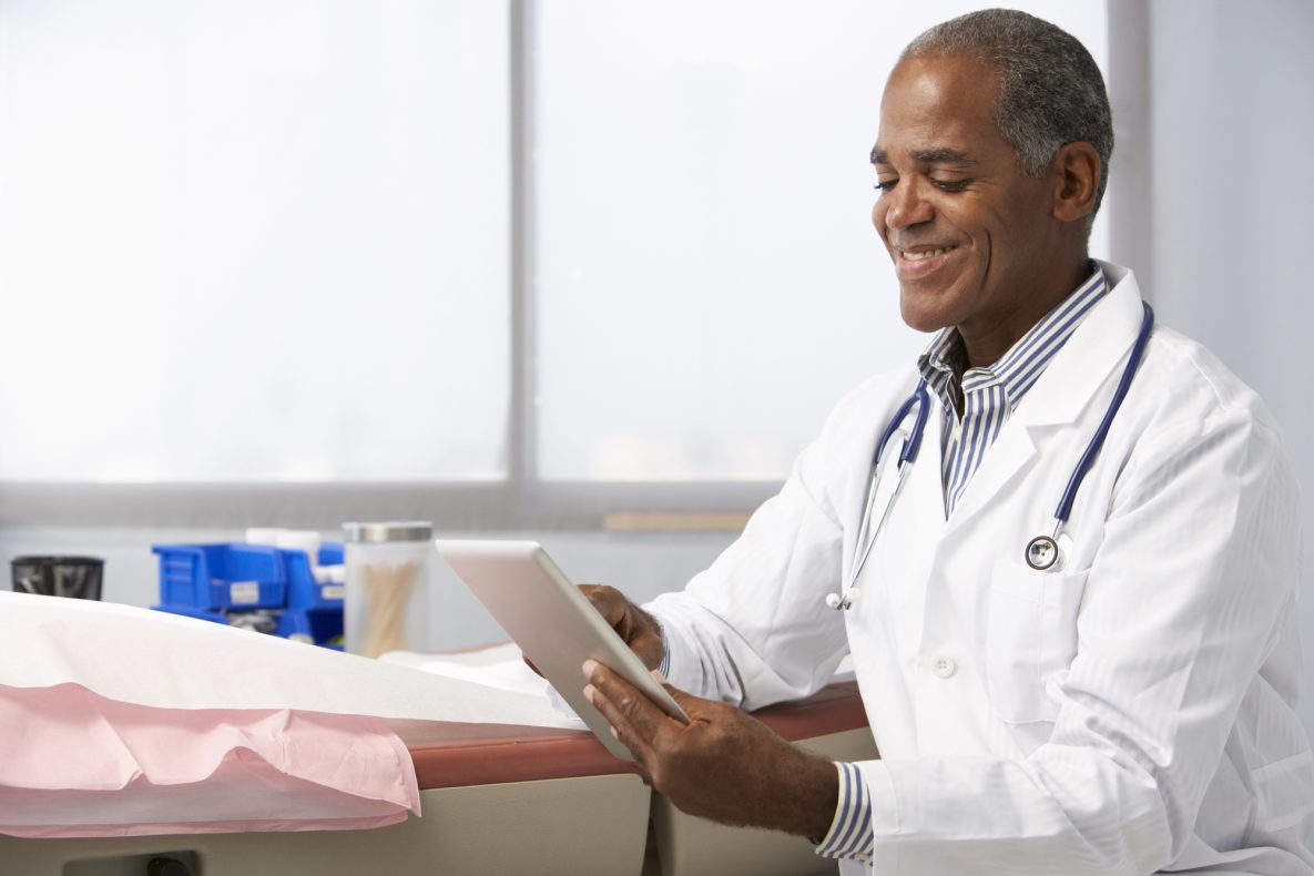 doctor tablet Doctor looking at a tablet