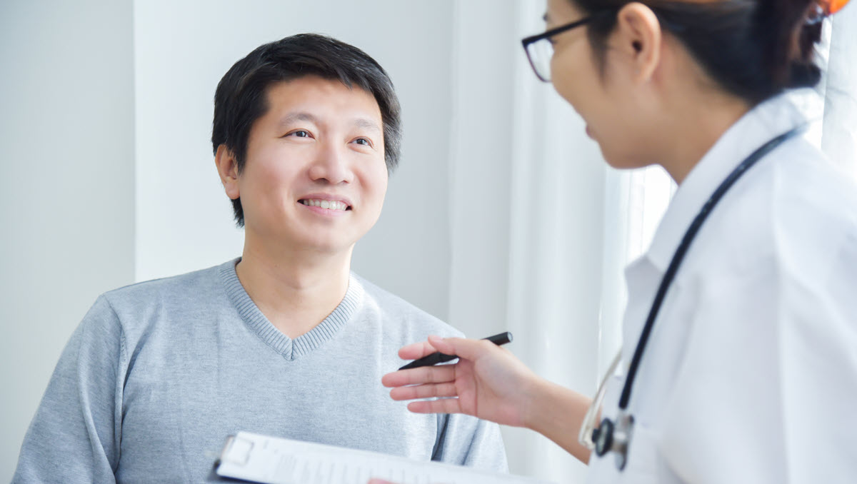 Patient talking with health care provider Patient talking with health care provider