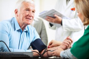 Cessation Resources for Veterans Picture of a senior man getting his blood pressure taken.