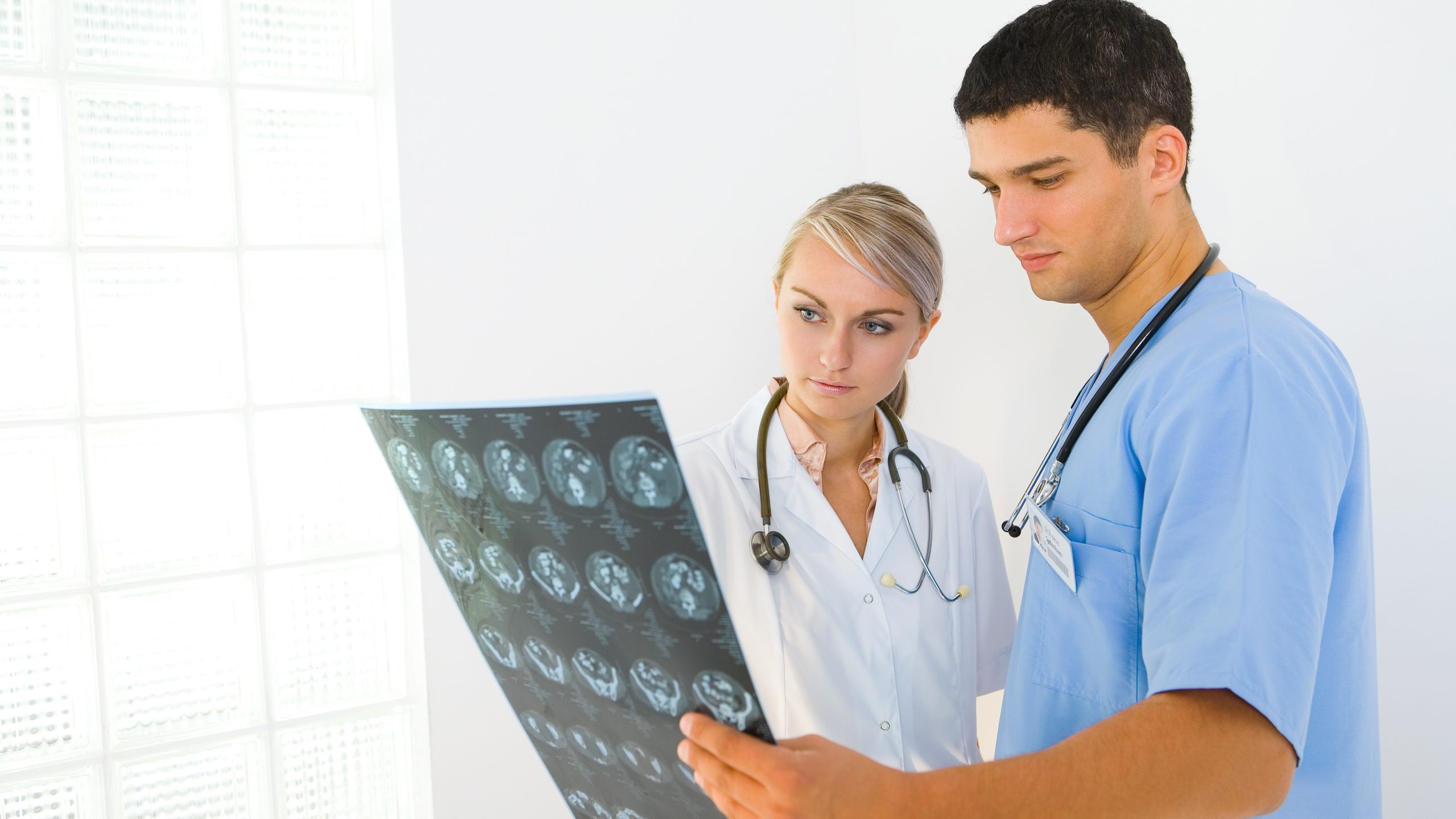 Brain scan Doctors looking at the results of a brain scan